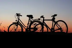 Photo of two bicycles at sunset. Photo taken by Pixabay at Pexels.