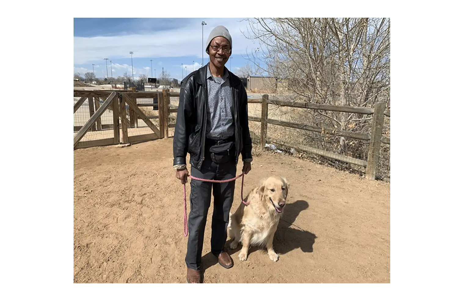 Photo of Kenny Cobbins with his dog, Cooper - Photo originally from Westword.