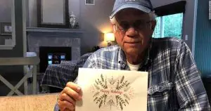 Photo of Michael Esmond and a Christmas note sent to people for whom he paid their past-due utility bills. Photo originally appeared in Faithpot.