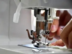 Photo of person using a sewing machine