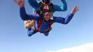 Photo of Hilary Oxley skydiving at age 90 - Photo by Photo by Chelsea Tooley with Skydive Headcorn.