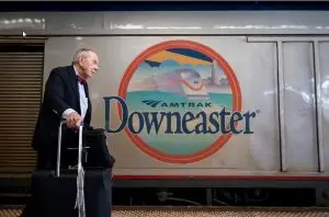 Nat Reed by Amtrak's Downeaster railcar - Photo by Vincent Alban for the Boston Globe