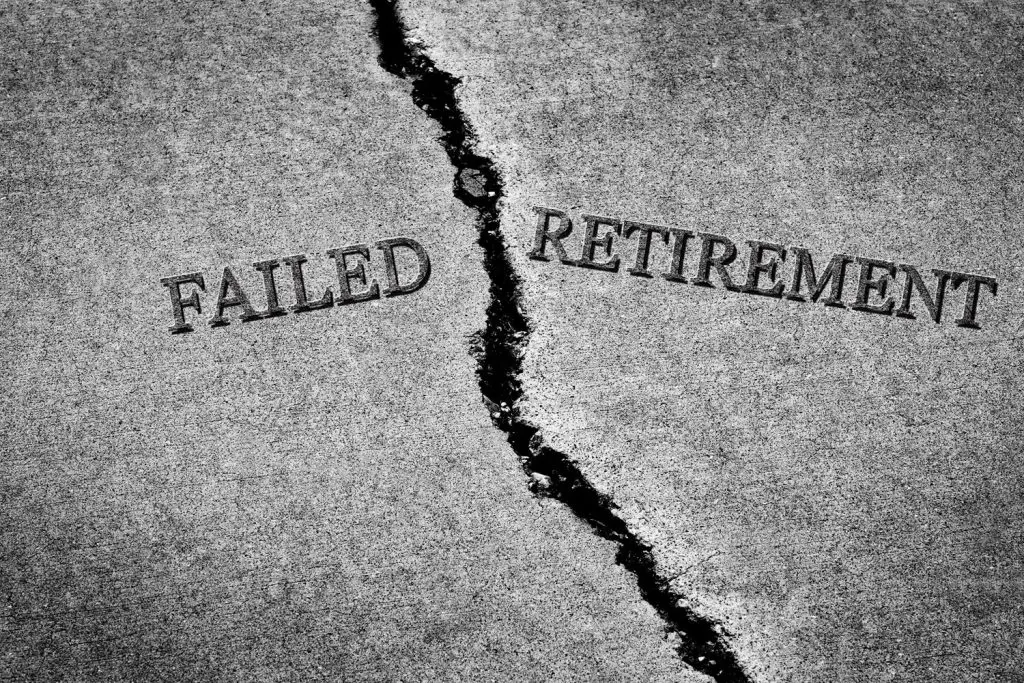 Photo of cracked cement with message about failed retirement.