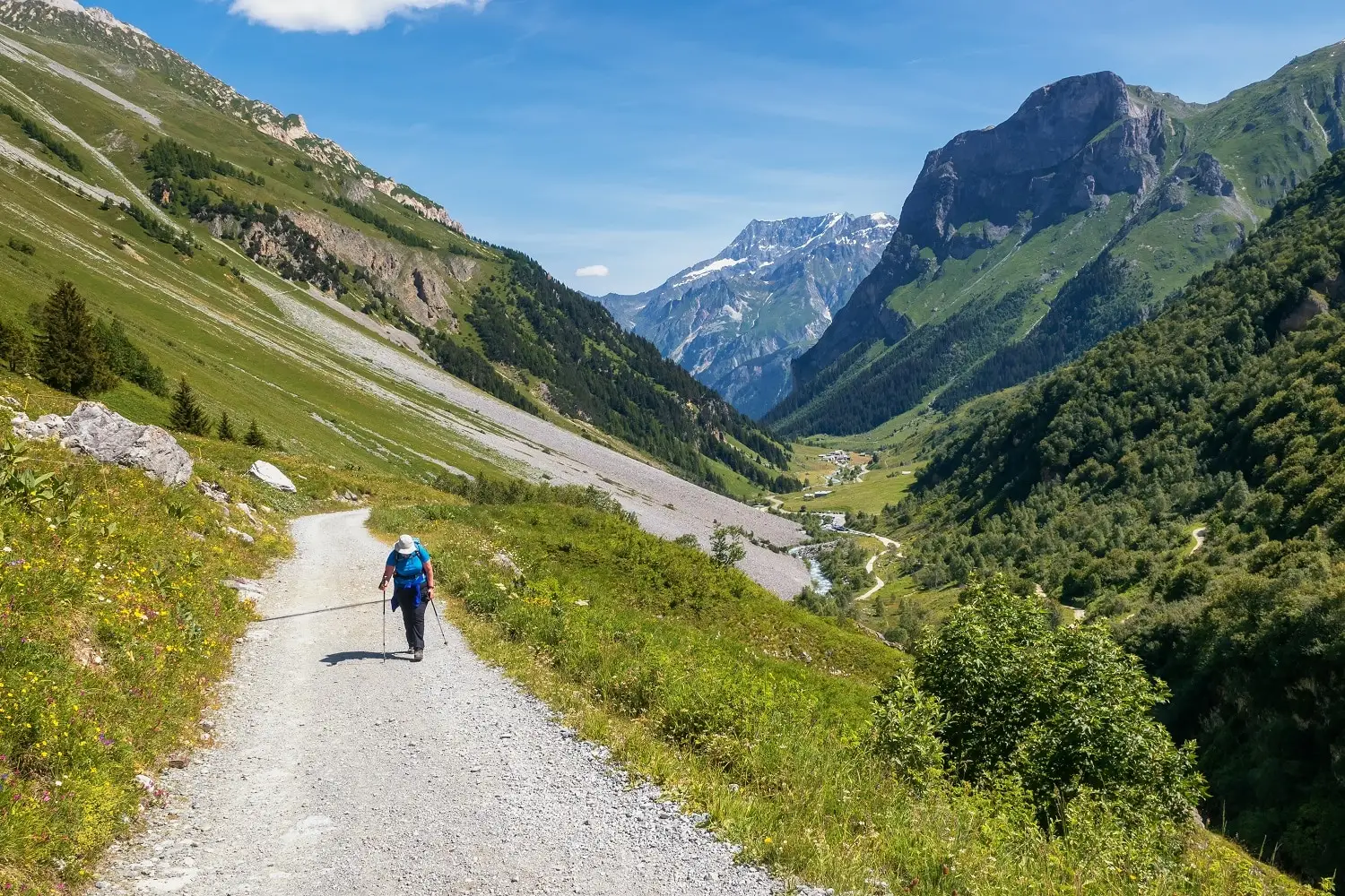 Photo of a person hiking along Europe's GR5 trail.