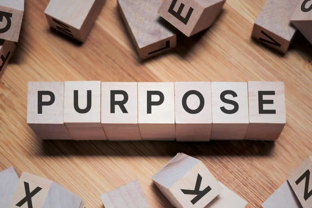 Image of the word "purpose" spelled out in wooden blocks
