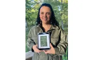 Photo of Sarah Geringer with her book, "Hope for the Hard Times."