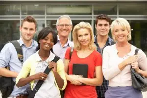 Photo of a mixed-generation group of adults.