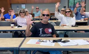 Chris Crawford, with Give 5 Class 26 during a partner visit - Photo by Give 5