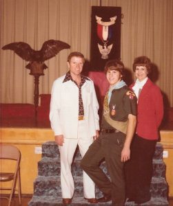 Photo of Greg Gerber with his parents when he received his Eagle Scout award. 